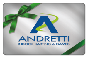 Andretti Karting logo on a wrapped givt with green ribbon and bow.